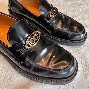 Tod's Shiny Black Leather Slip-On Loafers